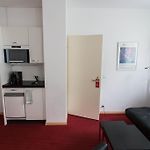 Astor Hotel & Serviced Studios