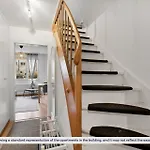 Contemporary Comfort: 2-Bedroom, Two-Floor Escape