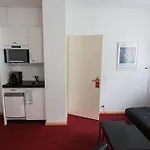 Astor Hotel & Serviced Studios